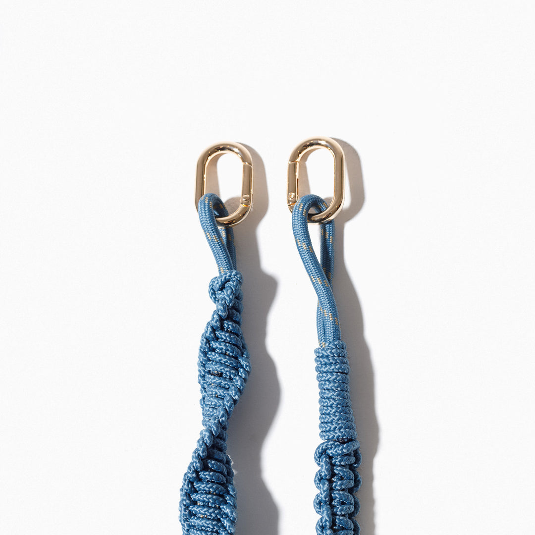 Stormy blue macrame strap with two metal carabiner rings and twisted braid