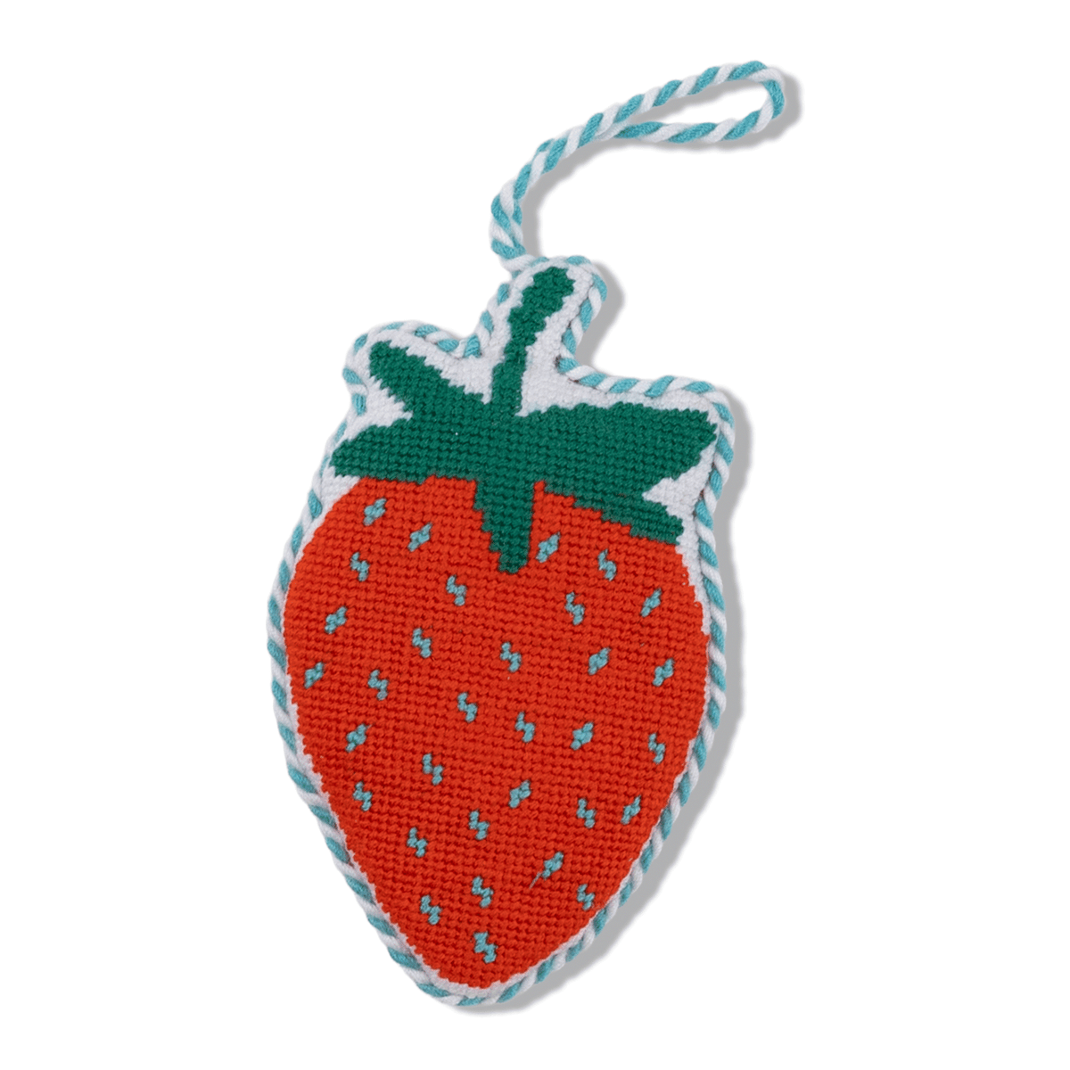 Needlepoint strawberry icon ornament with green leaves and red stitched body