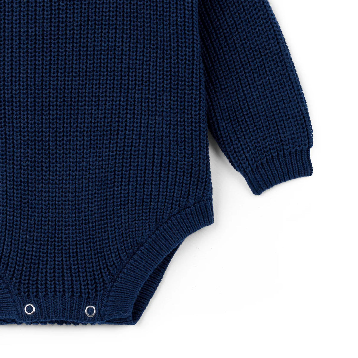 Navy knit baby romper with long sleeves and snap-button leg opening