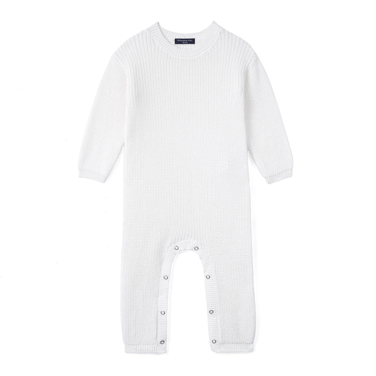White knit baby romper with long sleeves and snap-closure legs