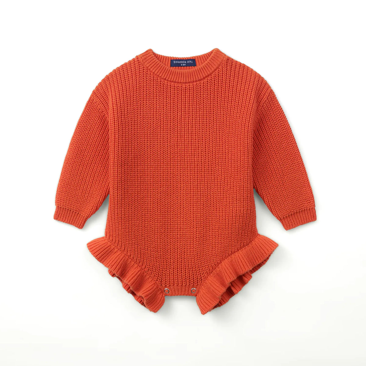 Orange-rust chunky knit baby romper with ruffled hem and ribbed cuffs