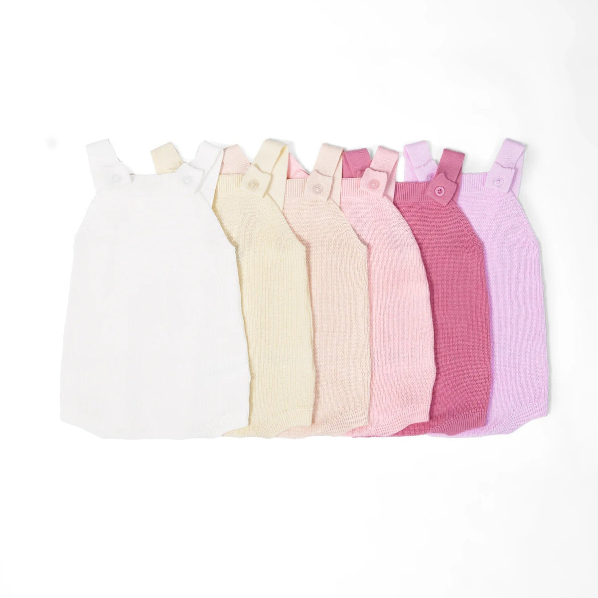 Lilac baby knit button-strap romper shown among pastel color options