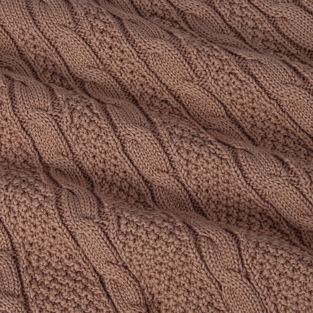 Mocha cable-knit fabric close-up with raised cable stitches
