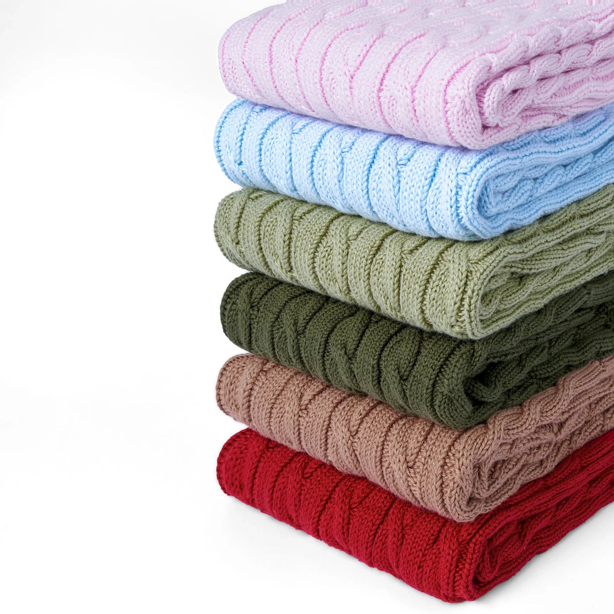 Stack of cable-knit shorts in multiple colors: pink, blue, olive, taupe, burgundy