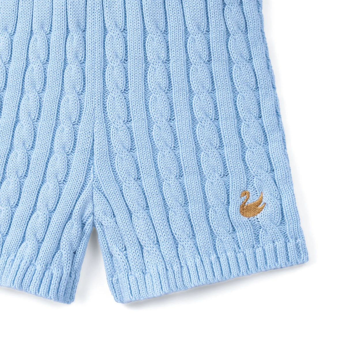 Baby blue cable-knit shorts with small embroidered bird logo on the side
