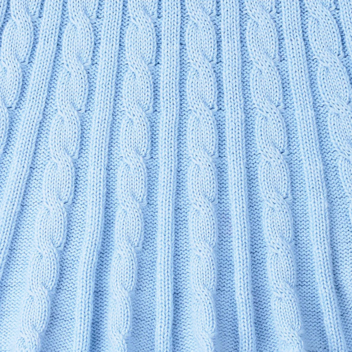 Baby blue cable knit skirt fabric with textured cable stitches