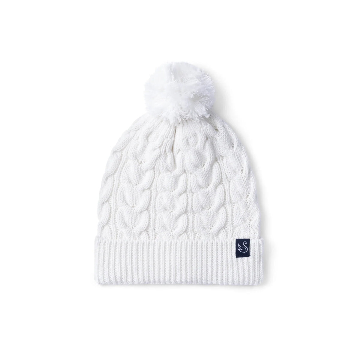 White cable knit baby beanie with ribbed brim and fluffy pom-pom top.