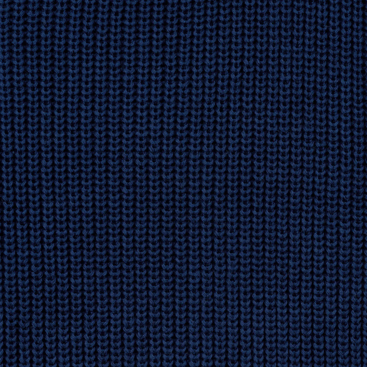 Navy knit baby sweater fabric close-up showing fine textured stitch pattern