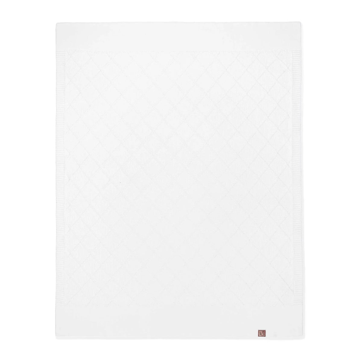 White diamond-stitch baby knit blanket, square with corner brand patch.