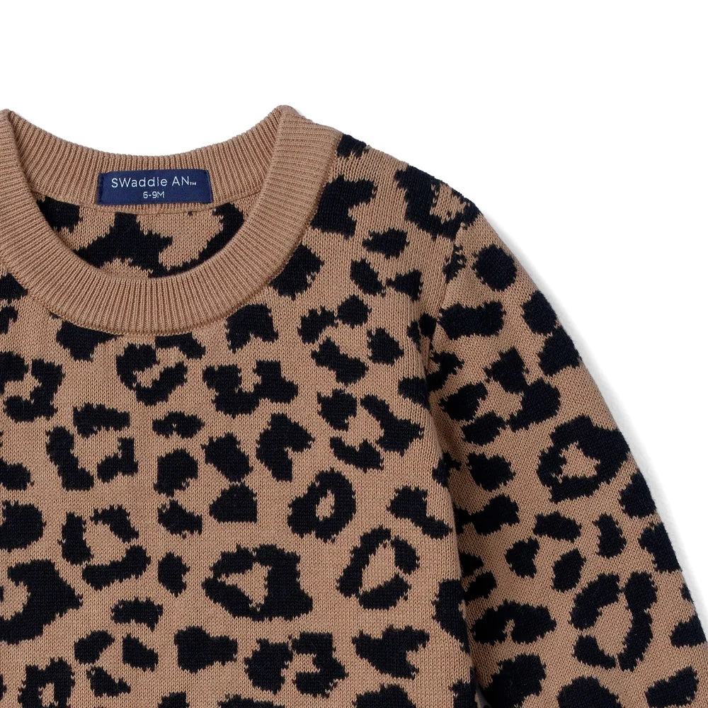 Leopard print knit romper close-up of shoulder and ribbed neckline