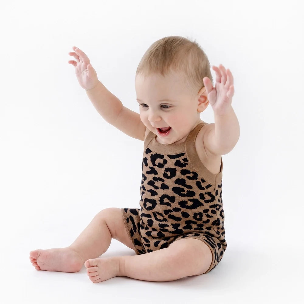 Beige leopard print baby knit playsuit on baby, sleeveless tank with short legs