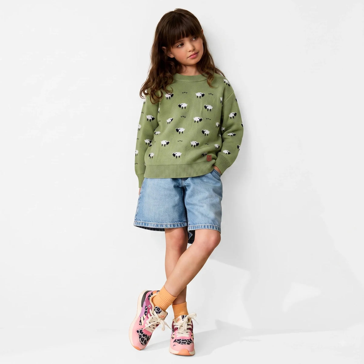 Kids olive green knit crewneck sweater with white sheep pattern and ribbed hem