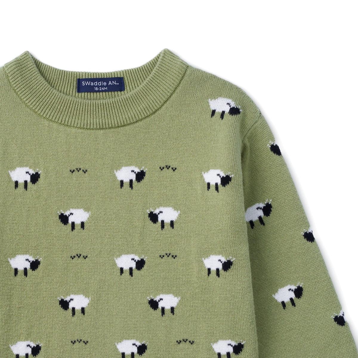 Kids olive green knit sweater with scattered white sheep and long sleeves
