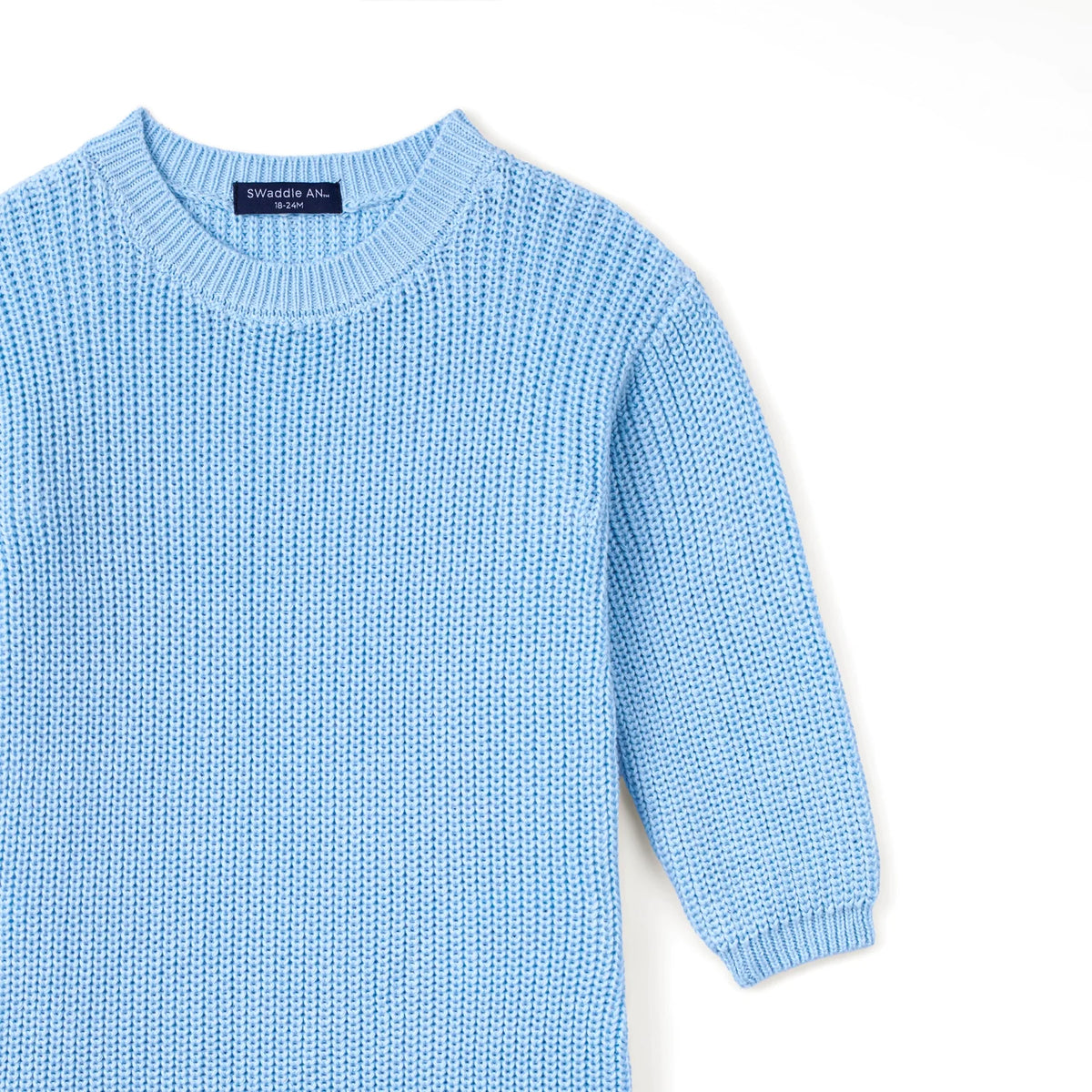 Baby blue knit romper with crew neck and long sleeves