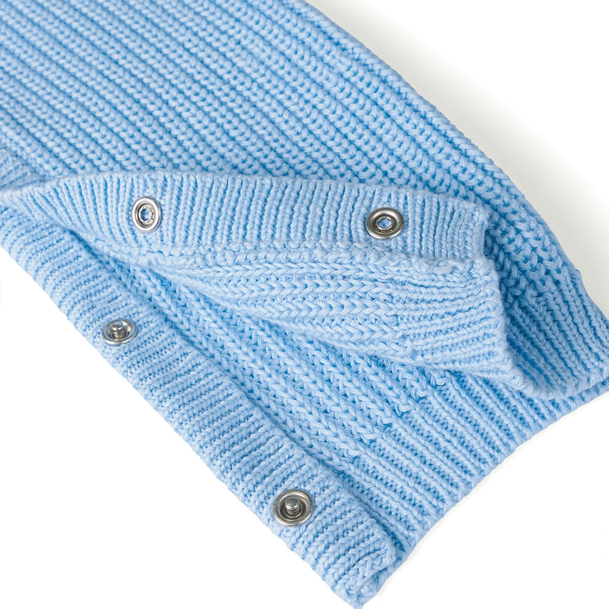 Baby blue knit romper with snap-closure opening at crotch