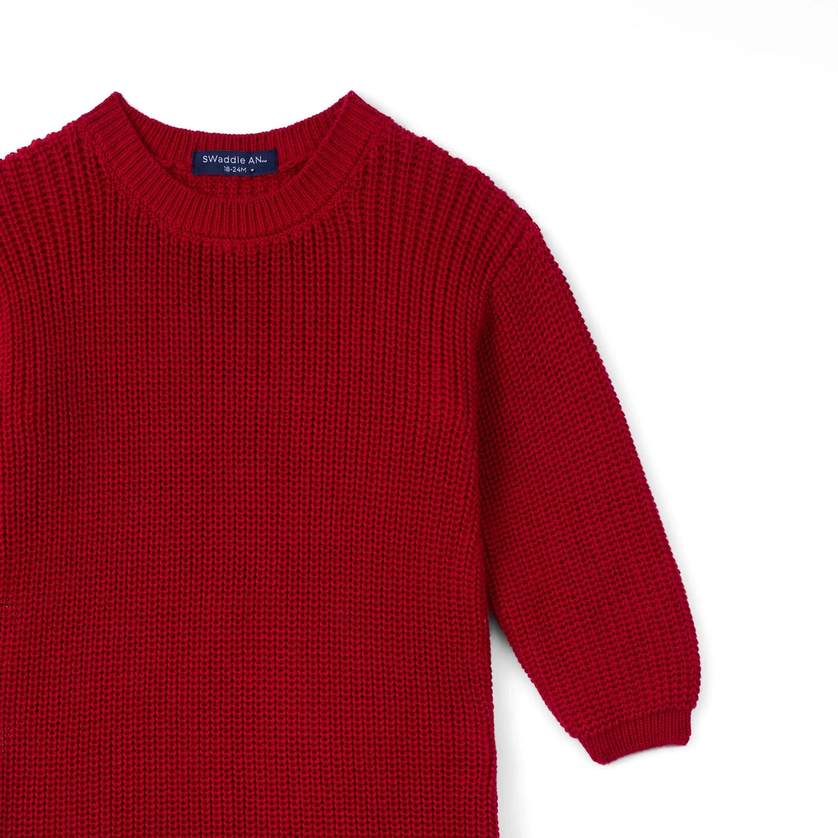 Red knit baby romper with long sleeves and ribbed knit cuffs