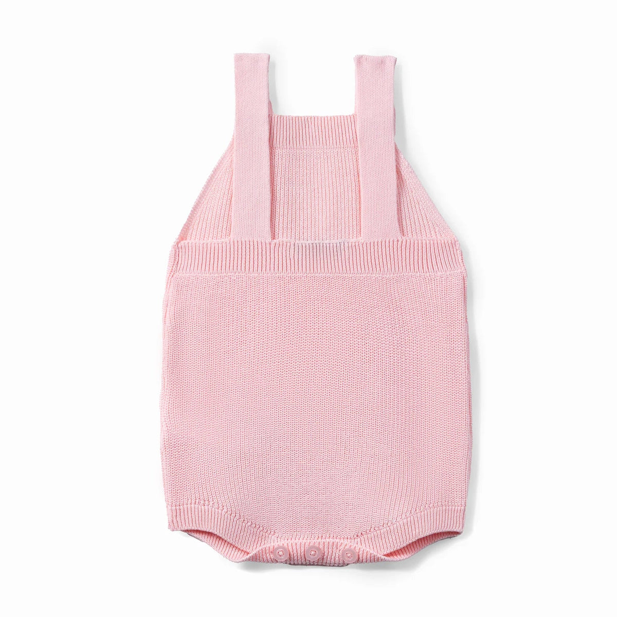 Baby knit romper in pink with wide straps and front snap buttons at leg opening