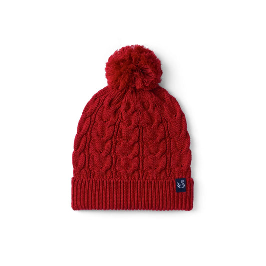 Red cable-knit baby beanie with pom-pom and S logo patch.