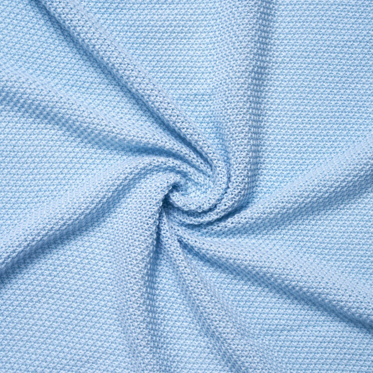 Light blue lace knit baby blanket fabric close-up with textured weave and soft folds