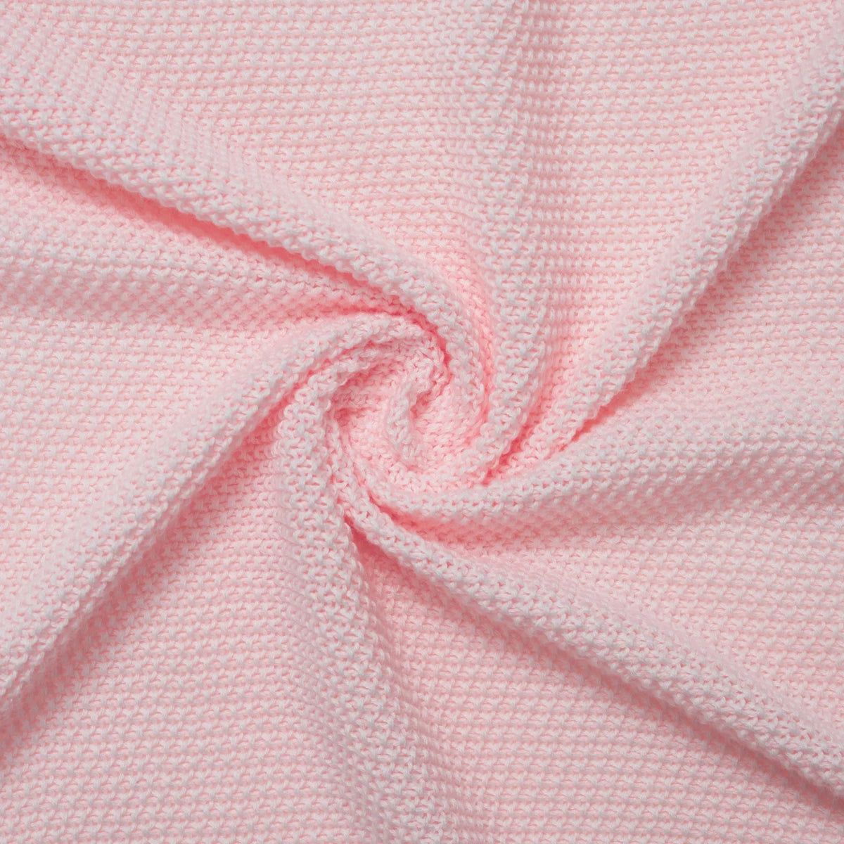 Pink knitted baby blanket fabric with layered ruffle edge detail
