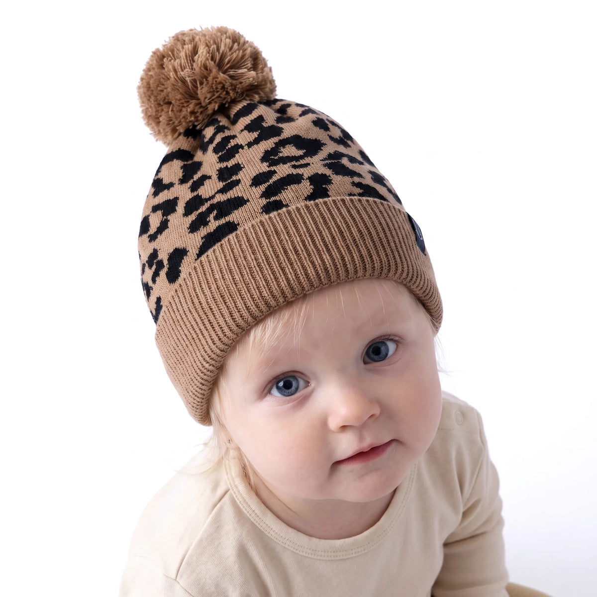 Brown ribbed cuff leopard knit baby beanie with top pom-pom