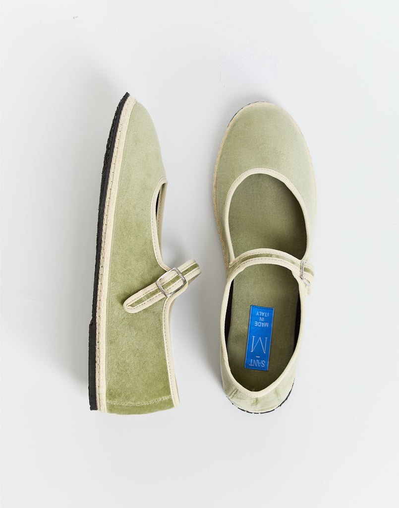 Sage green suede Mary Jane flats with ankle strap and white sole