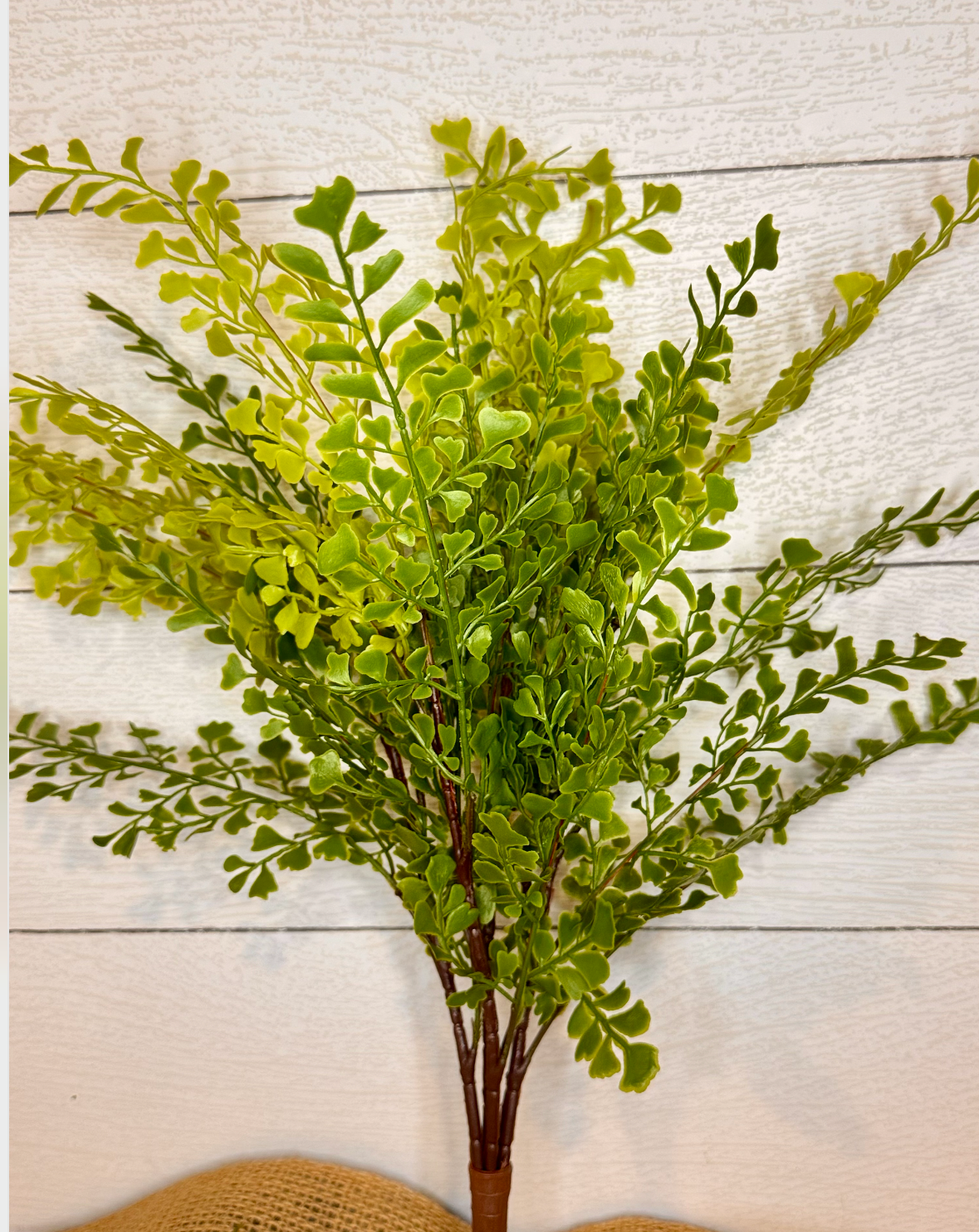 Artificial maidenhair fern bundle with vivid green fronds and brown stems, tied with twine