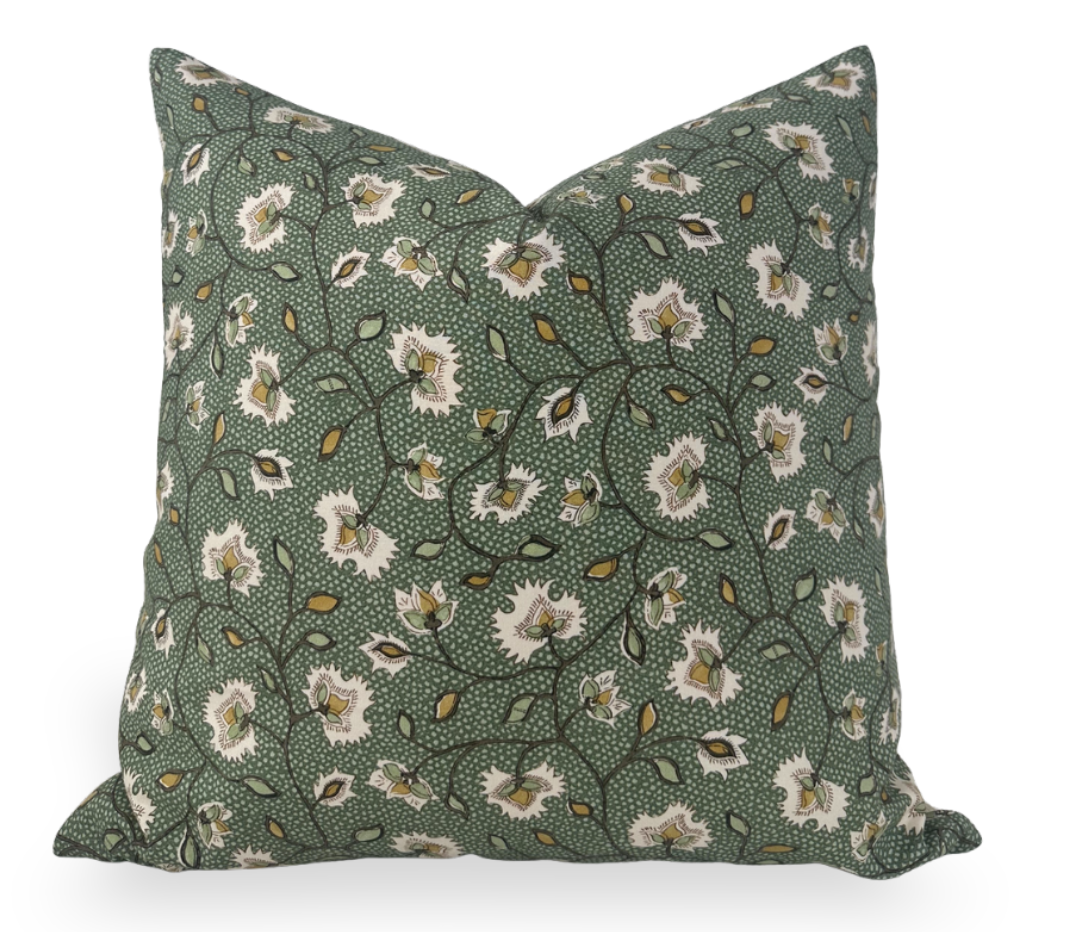 Emerald green floral pillow cover with cream, yellow, and brown botanical pattern