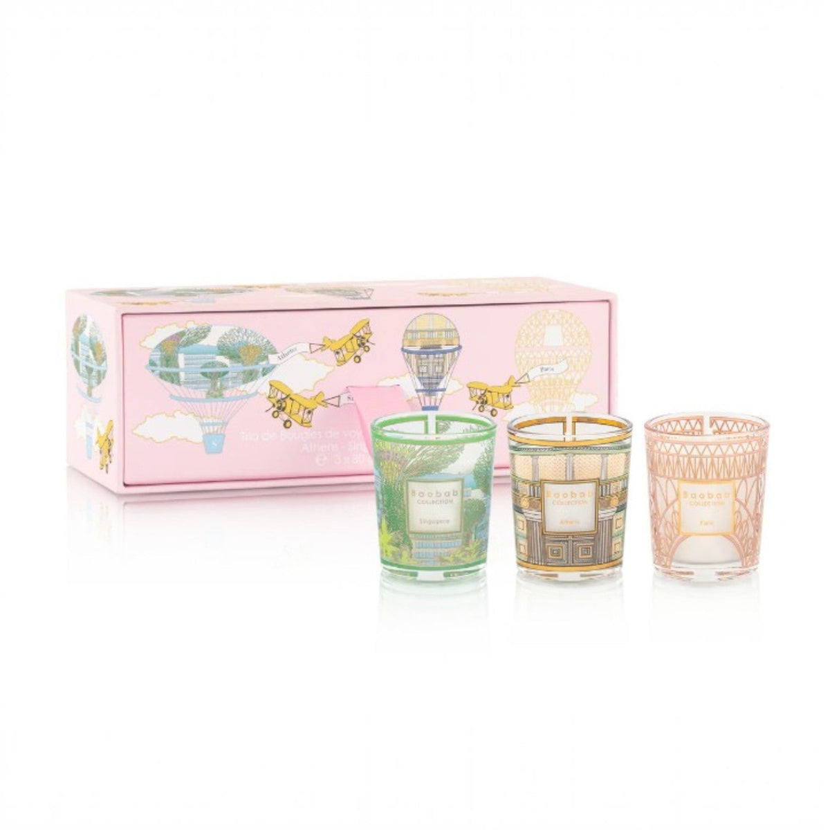 Trio travel candles set with pink gift box and three patterned glass jars: green, gold, peach