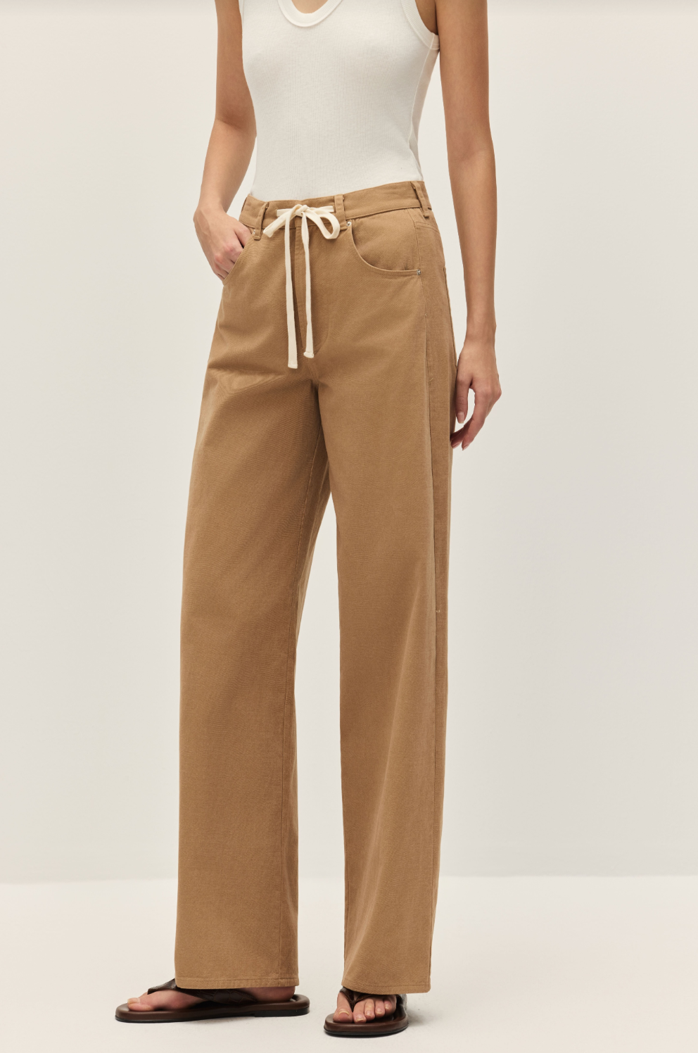Mocha wide-leg pants with front pockets and white tie drawstring waist