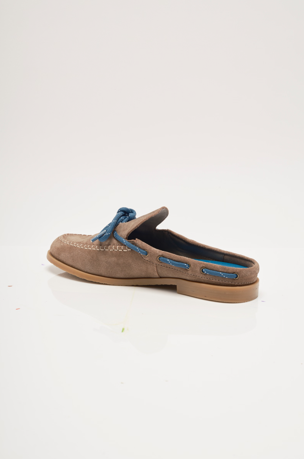 Tan suede mule with blue lace detail and side stitched trim