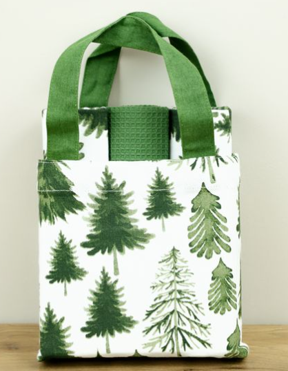 Green and white towel set with a tree-print bag and green handles