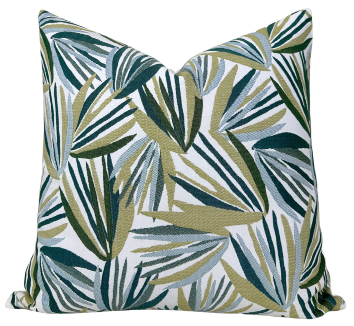 Square throw pillow cover with tropical leaf pattern in teal, green, and cream, centered bowtie corners.