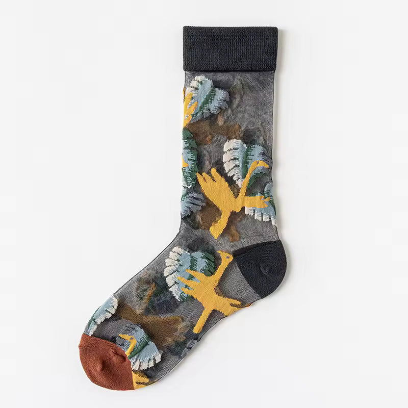 Sheer plant lover socks with dark botanical pattern and yellow flower details