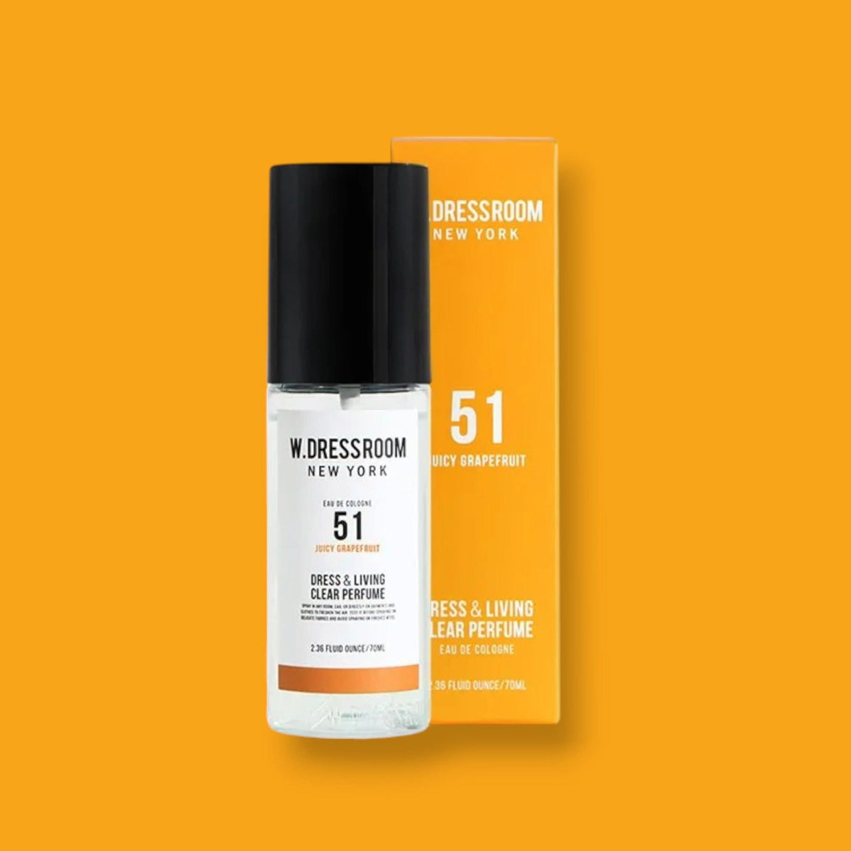 W.Dressroom No.51 Juicy Grapefruit clear perfume bottle beside orange package