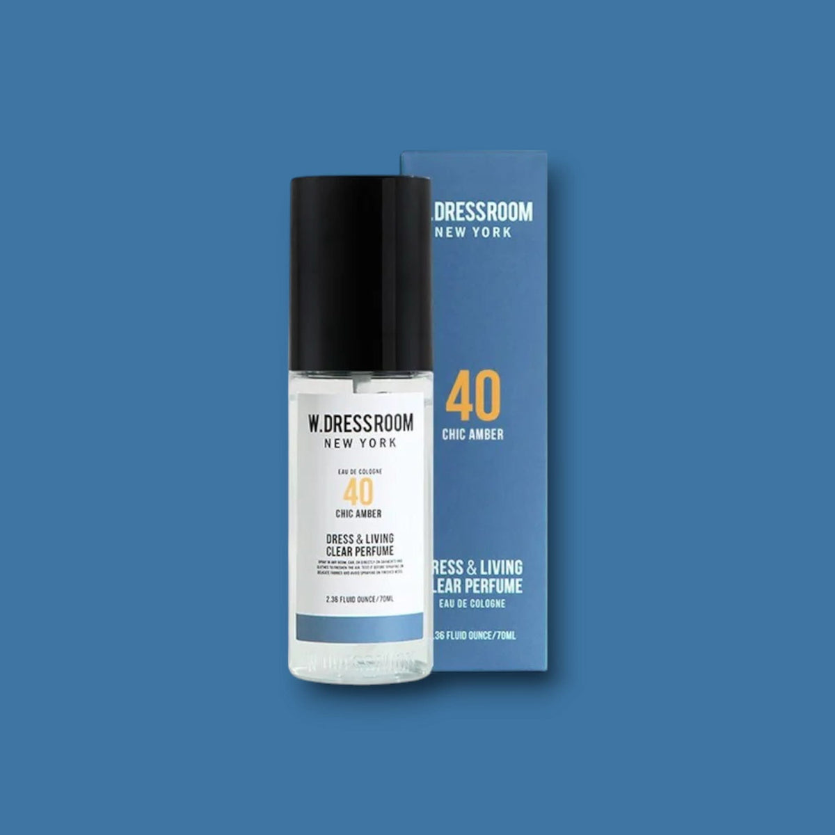 Clear fragrance bottle with black cap and blue “40 Chic Amber” box, front view.