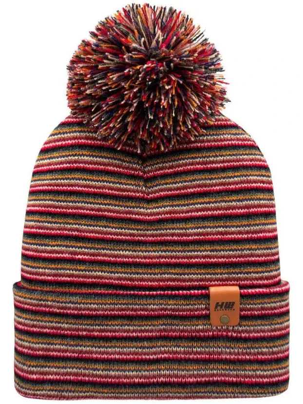 Multicolor striped knit cuff beanie with large pom pom and leather logo patch