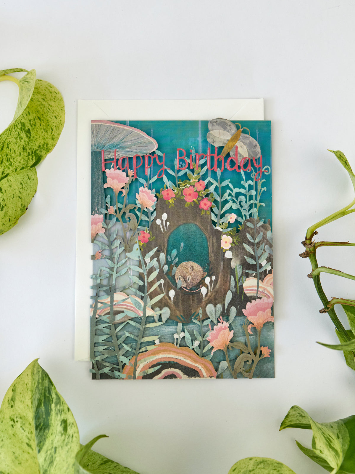 Lasercut birthday card, teal floral garden scene with sleeping dormouse and 'Happy Birthday'