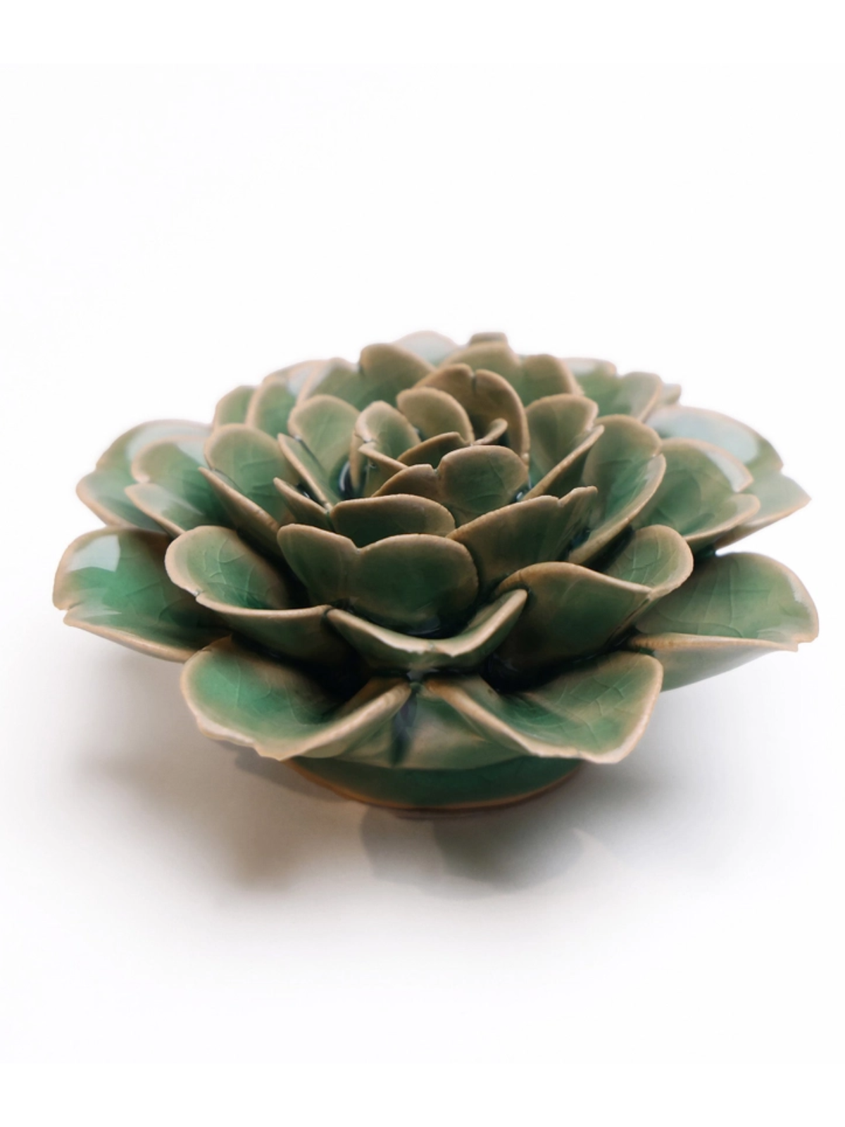 Ceramic green rose ornament with layered petals and dark rosette center