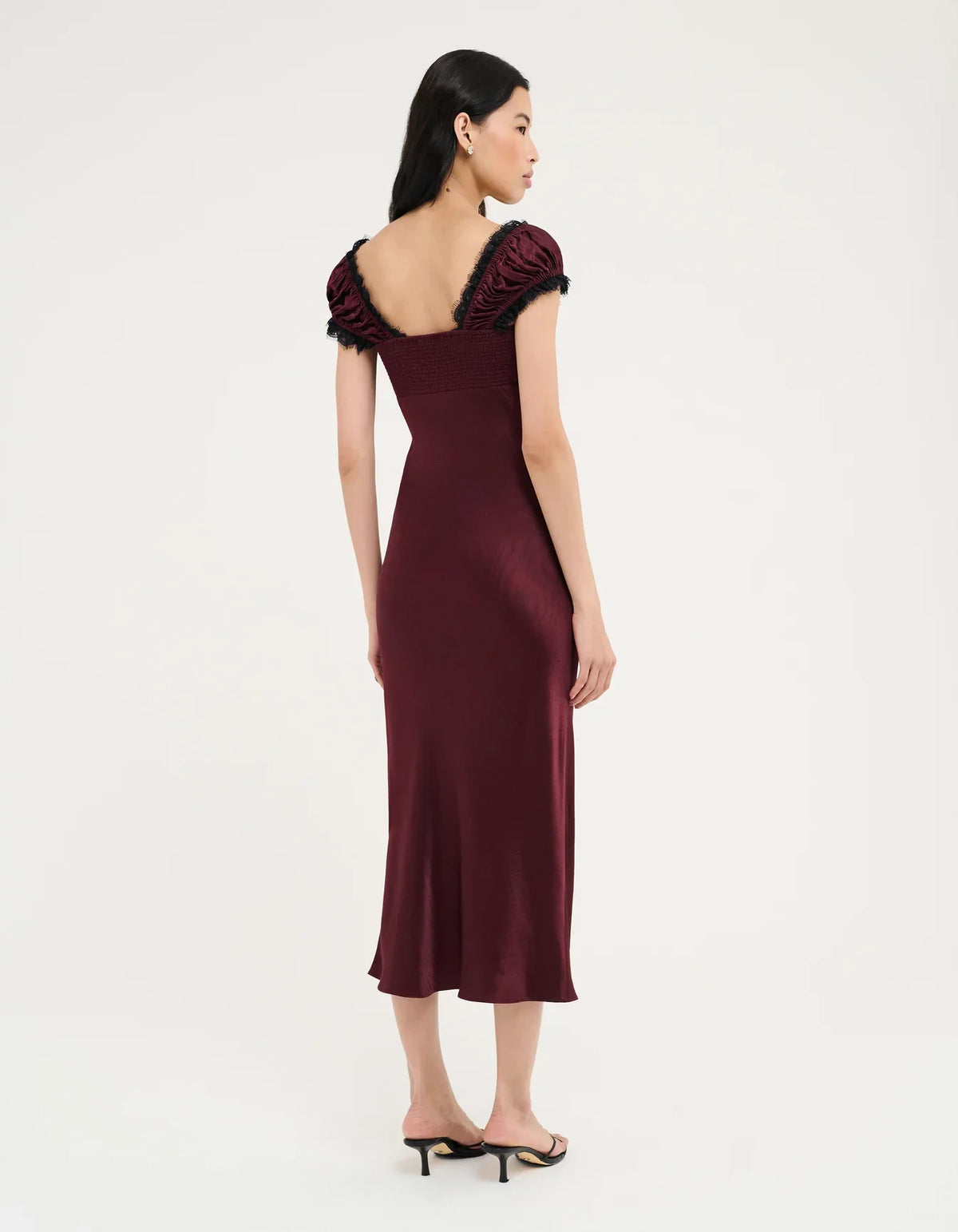 Burgundy midi dress with lace-trimmed short puff sleeves, fitted back view