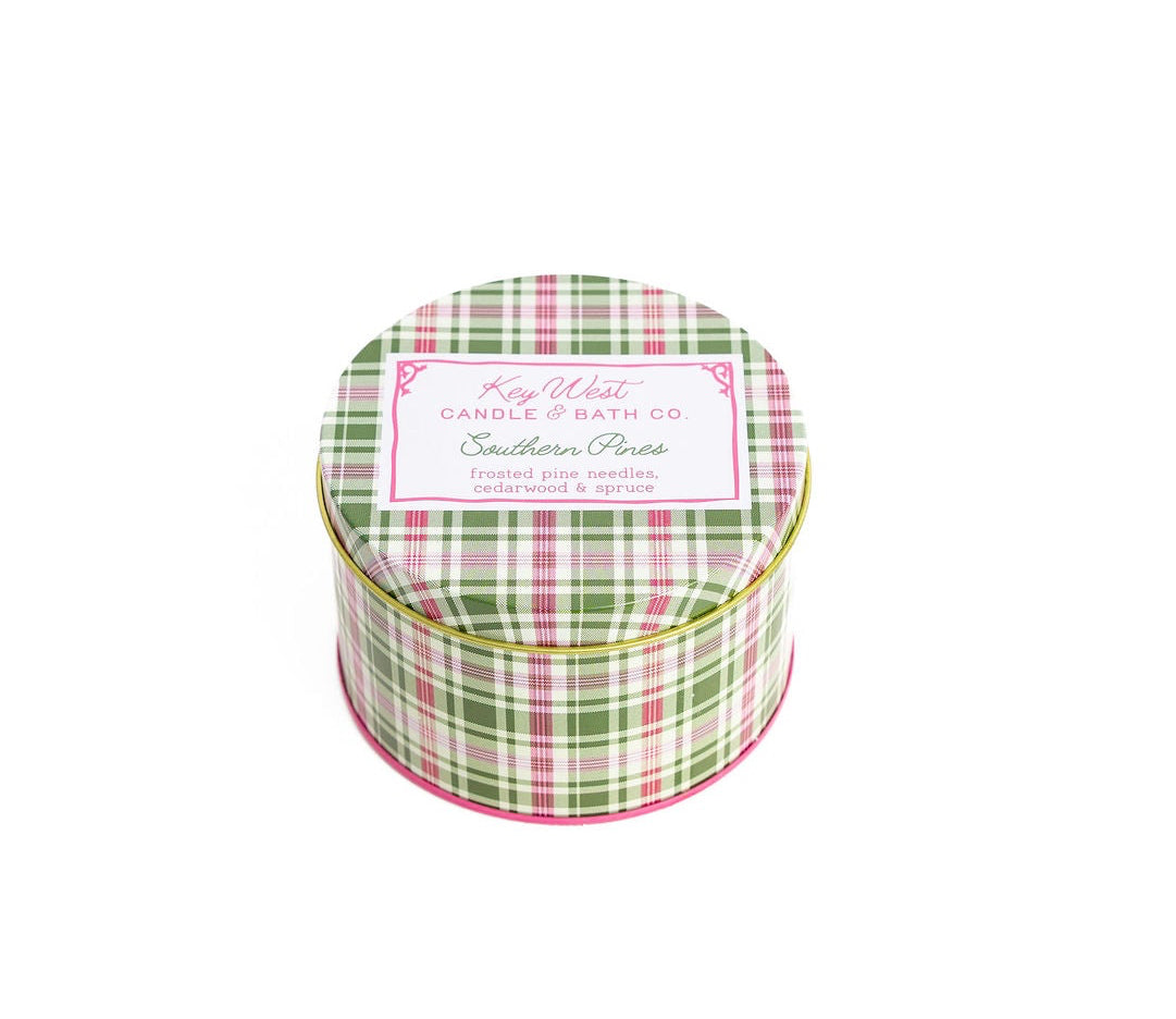 Round travel candle tin with green-red plaid lid and Key West label