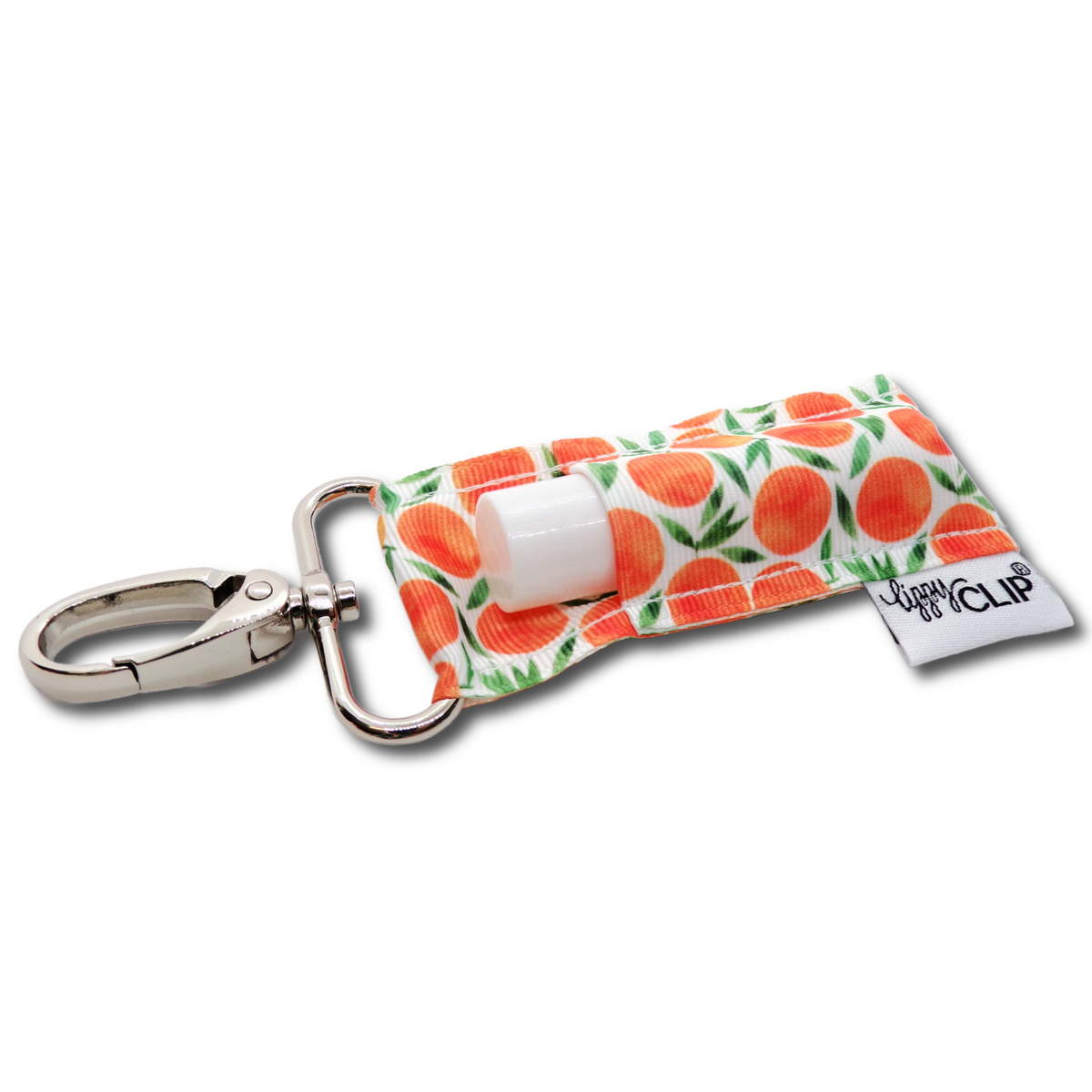 Floral lip balm holder with metal carabiner clasp and white cap, orange accents