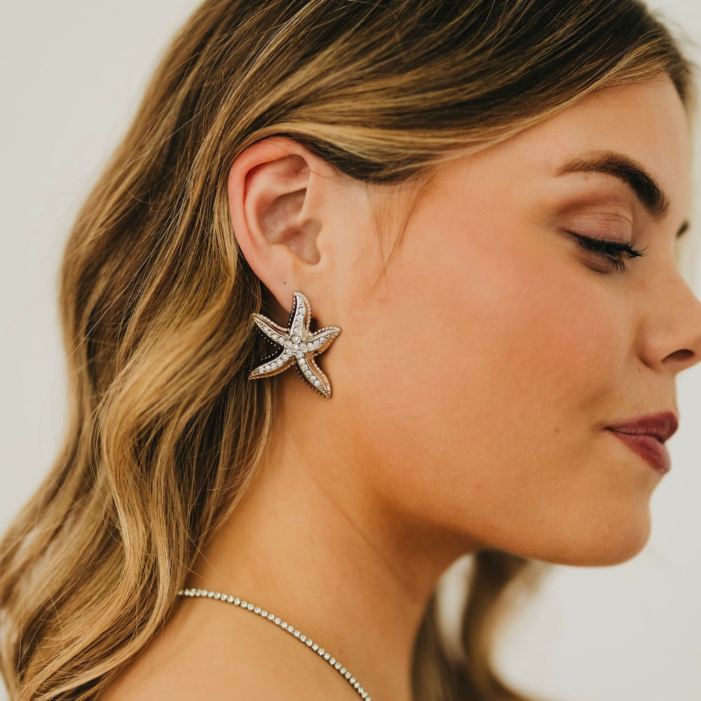 Starfish earrings, silver tone with crystal-studded starfish detail