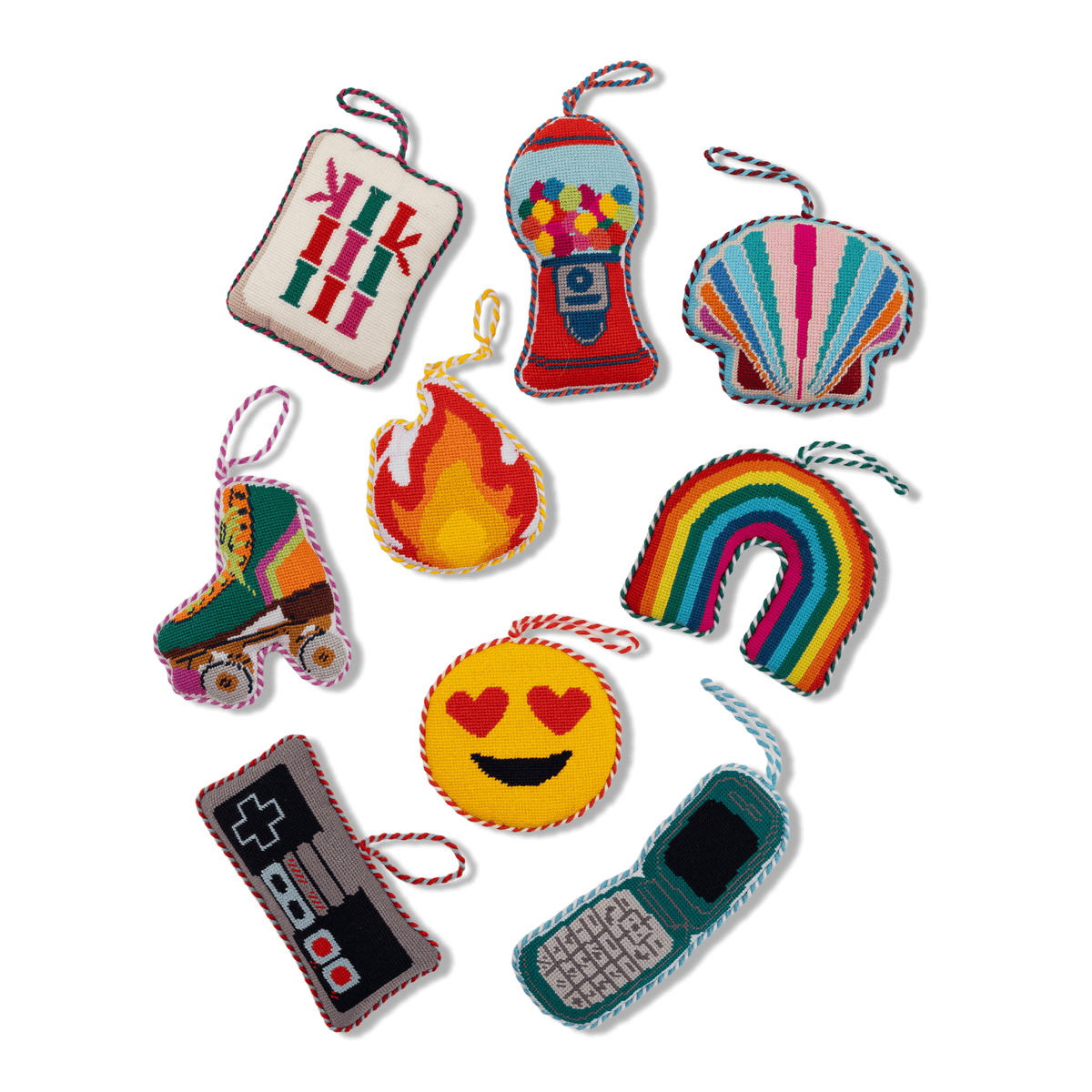 Needlepoint roller skate icon ornament with rainbow stripes and white wheels