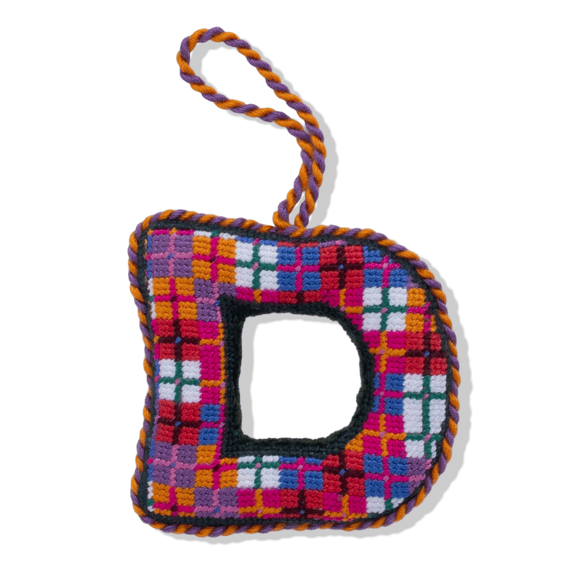 Needlepoint monogram ornament letter D with multicolor plaid grid stitches and hanging loop