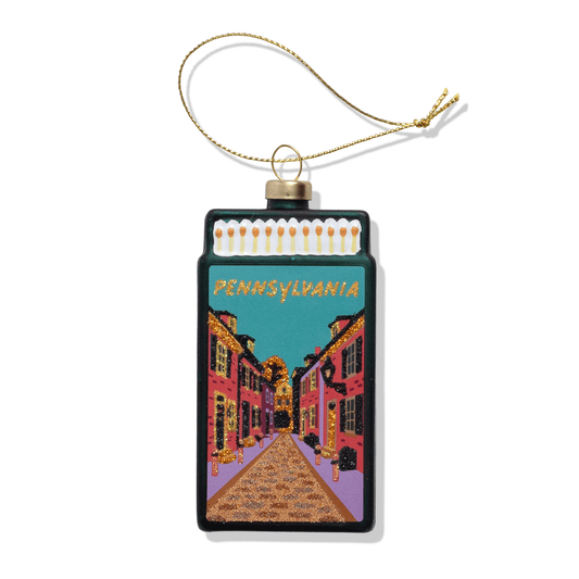 Pennsylvania matchbook ornament with teal rectangular frame and city street graphic