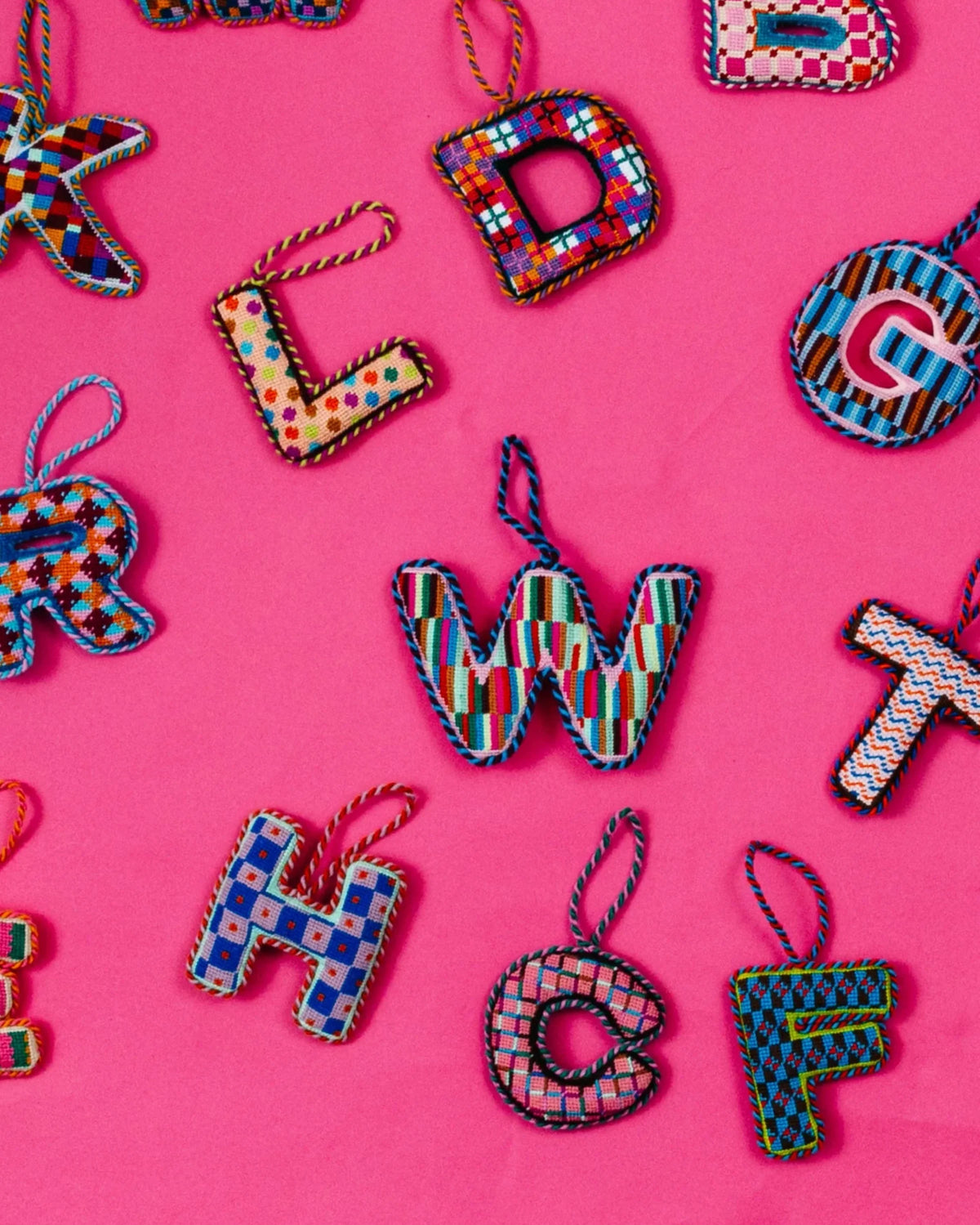 Needlepoint monogram letter W ornament, patchwork plaid stitched pattern with hanging loop