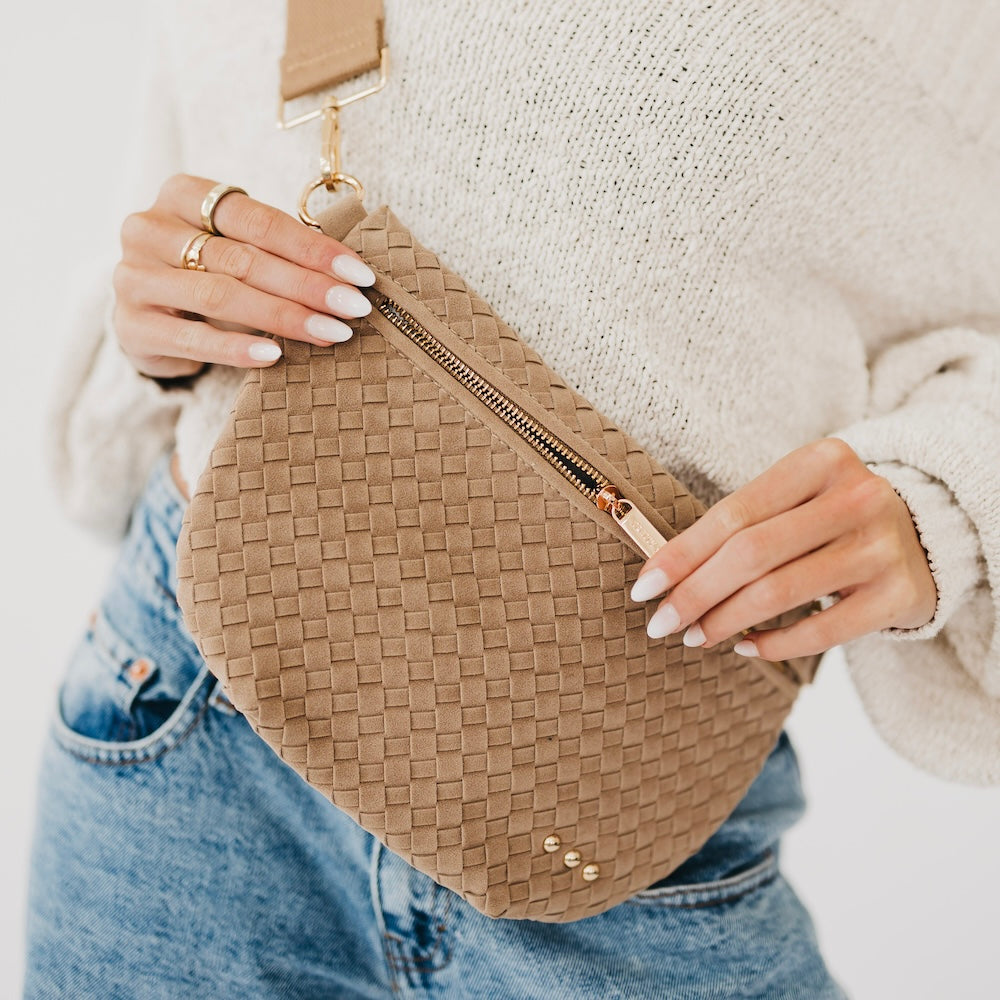 Suede Westlyn woven bum bag in tan, zip top and adjustable crossbody strap.