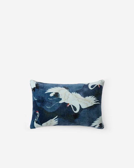 Navy small lumbar pillow with white crane and red beak pattern, velvet look.