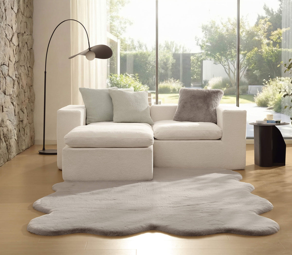 Light grey faux fur large area rug with shag texture
